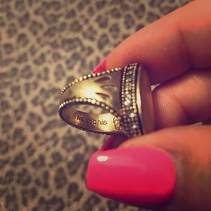 Lia Sophia gold ring with yellow iridescent stone